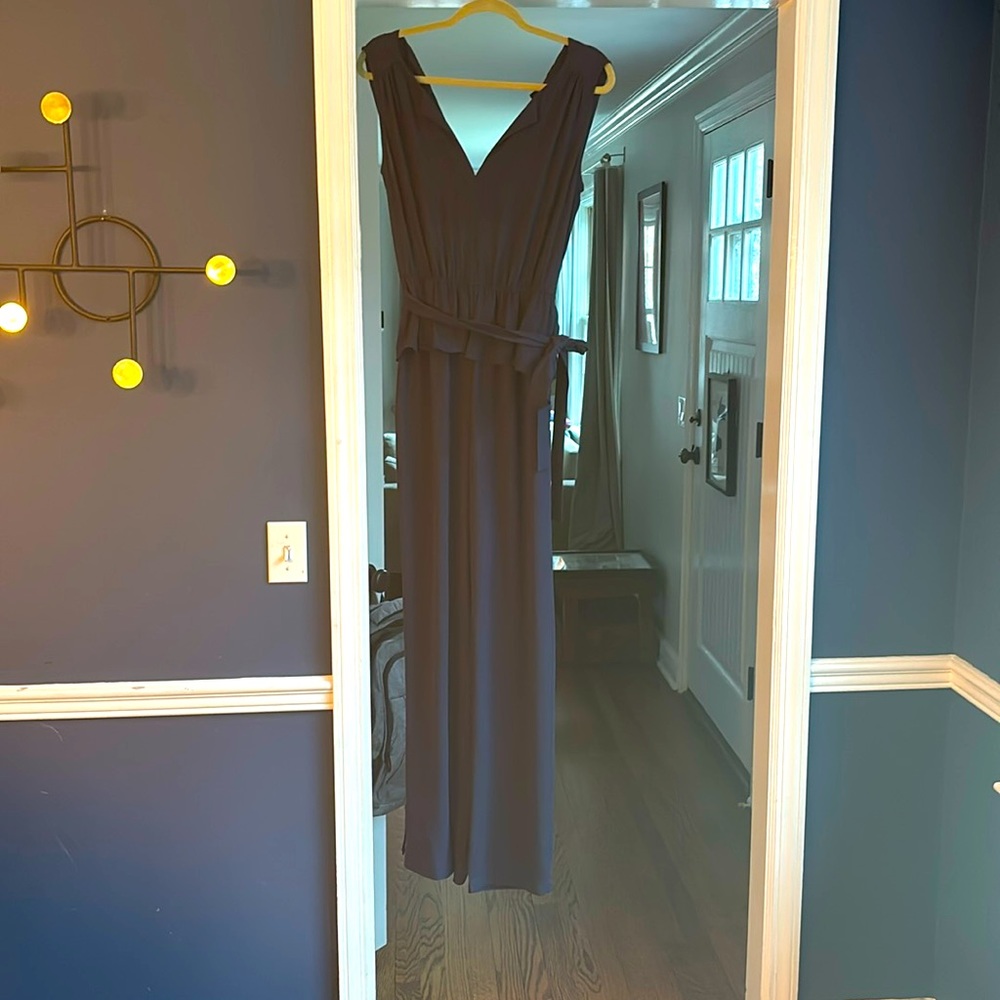 Navy blue pantsuit, poly blend, BCBG brand . Very flattering!